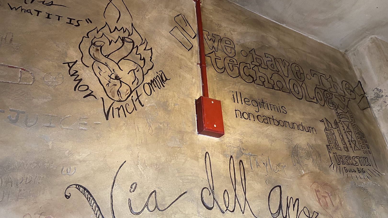 Handwritten artwork on a wall